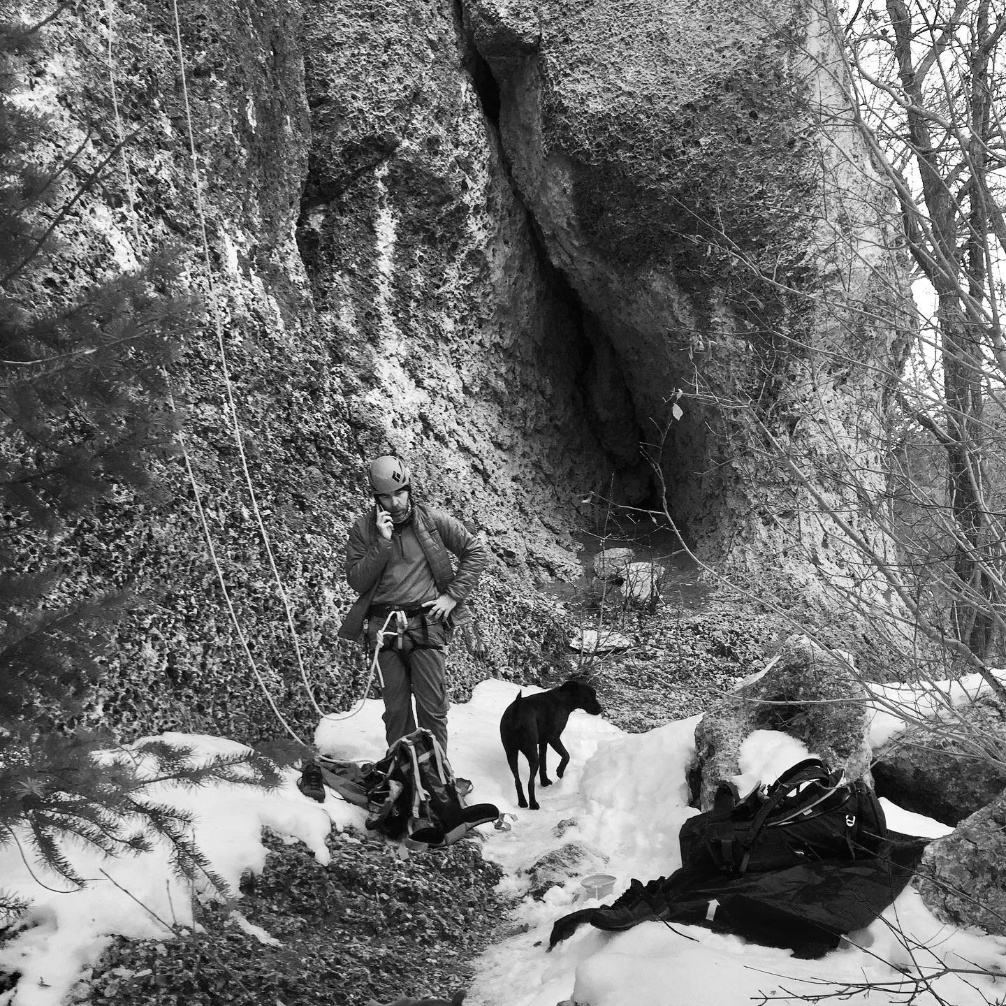 Climber at the base of a Bighorn wall